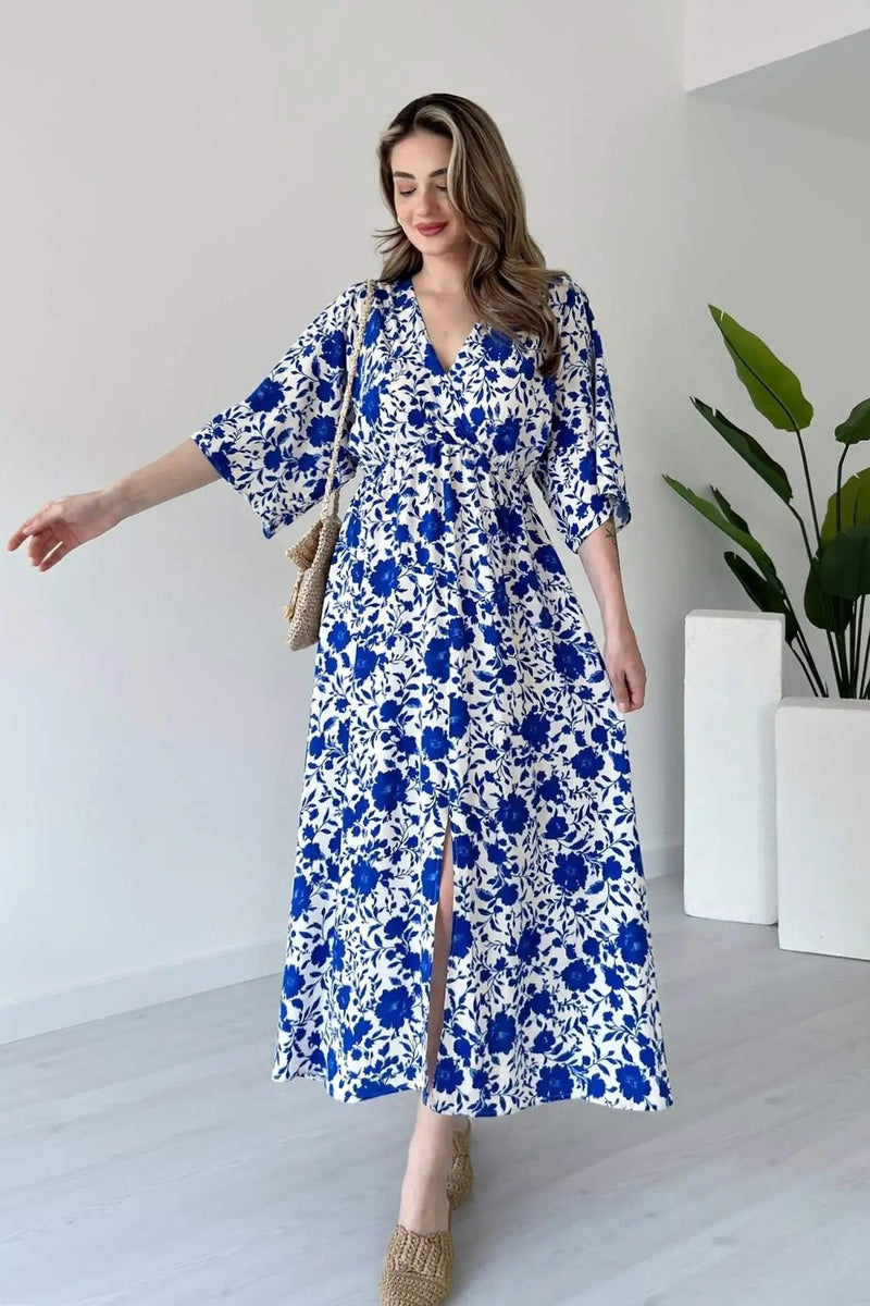 Lady blue printed rayon dress side pose