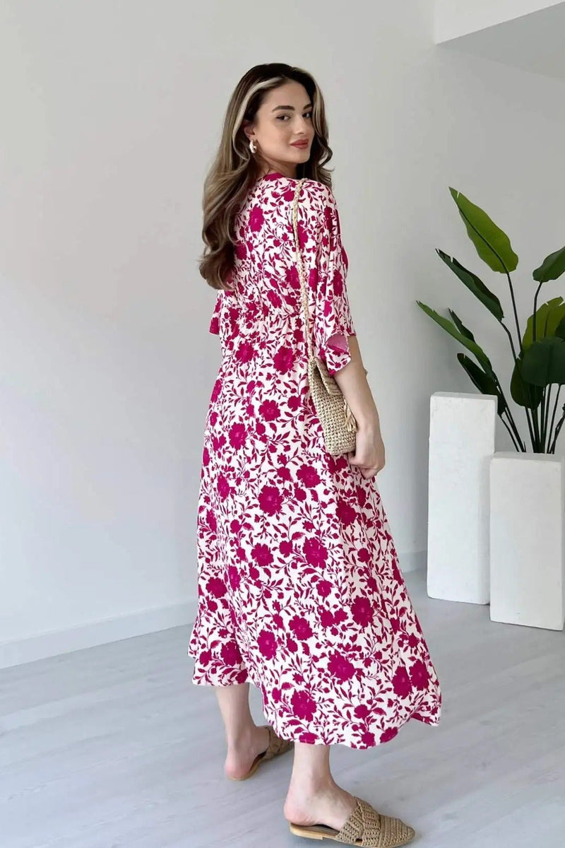 Girl wearing pink floral calf length rayon dress