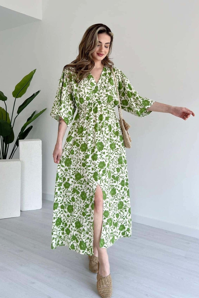 Stylish green printed rayon dress with 3/4 sleeves girl