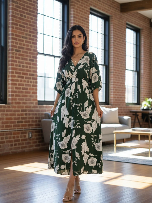 Femail green printed rayon dress walking pose
