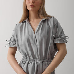 Women wearing grey calf length rayon dress


