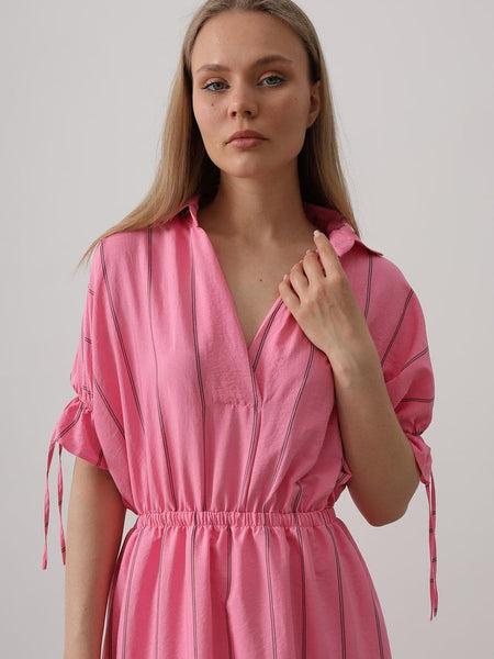 Women casual pink rayon dress indoor look
