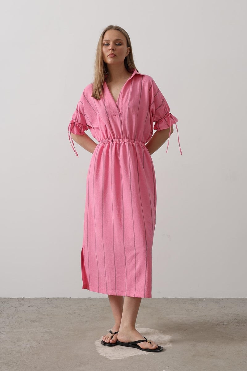 Women pink rayon fit and flare dress front view
