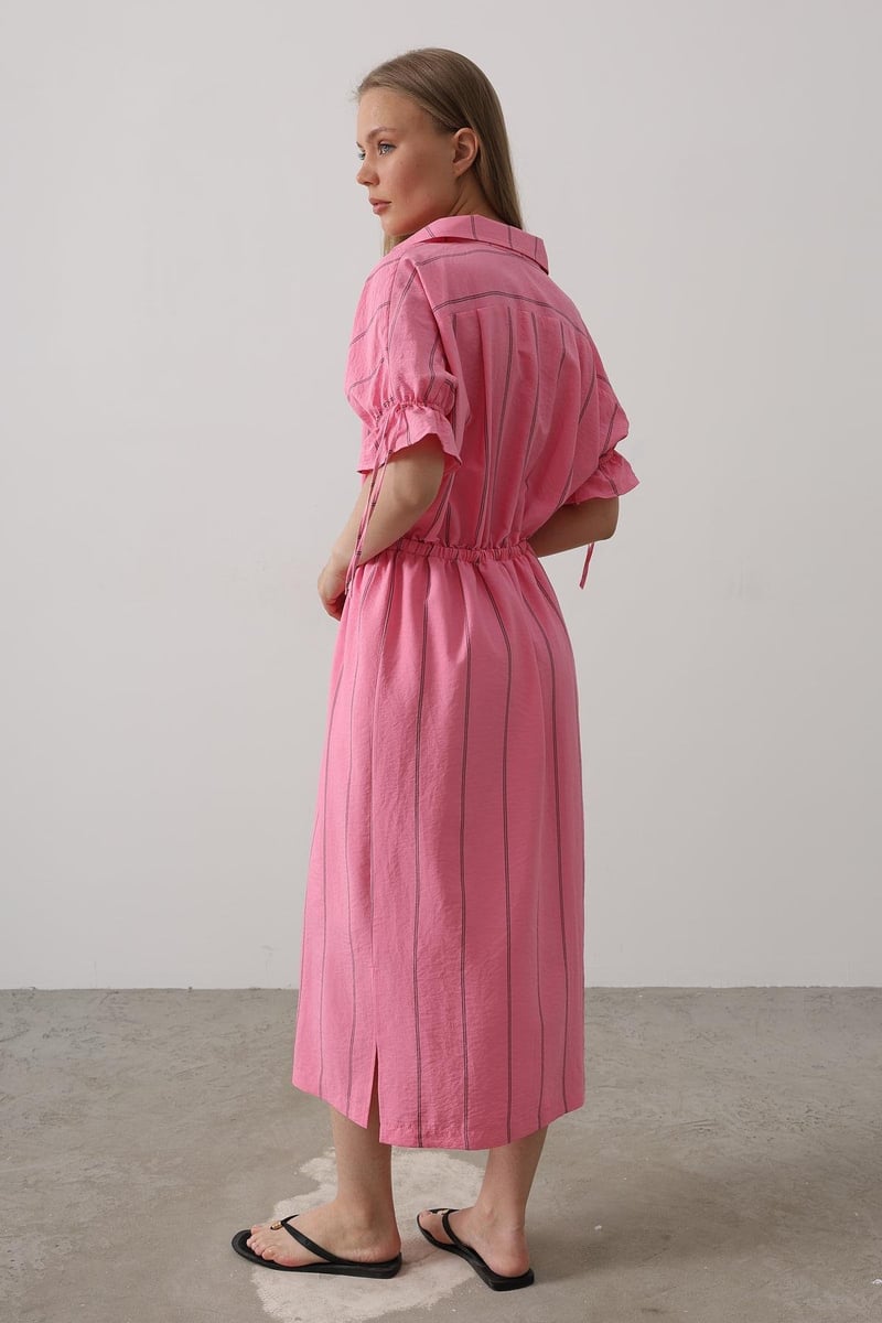 Women wearing pink collar neck calf length dress
