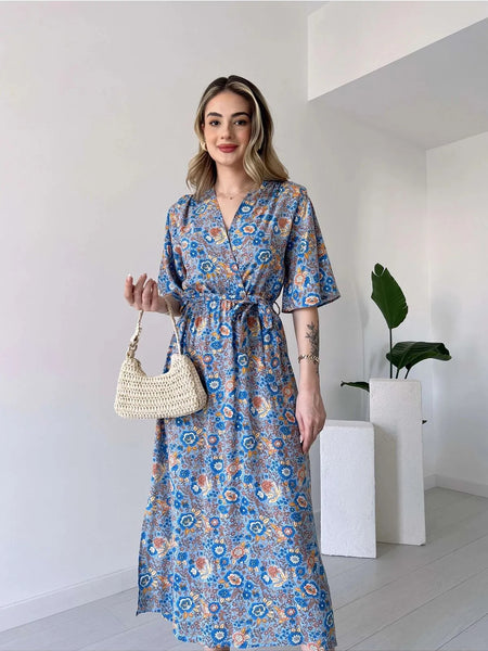 Woman wearing multicolor floral V neck dress
