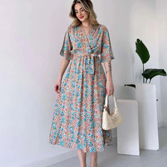 Lady wearing multicolor floral V neck dress
