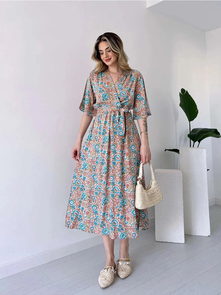 Lady wearing multicolor floral V neck dress
