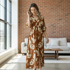 Woman wearing brown floral calf length rayon dress
