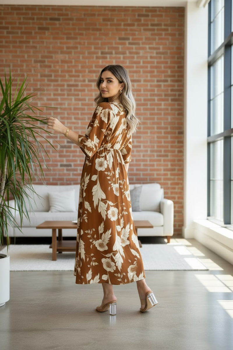 Woman brown printed rayon dress walking pose
