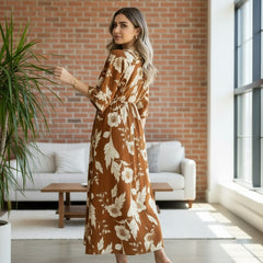 Woman brown printed rayon dress walking pose
