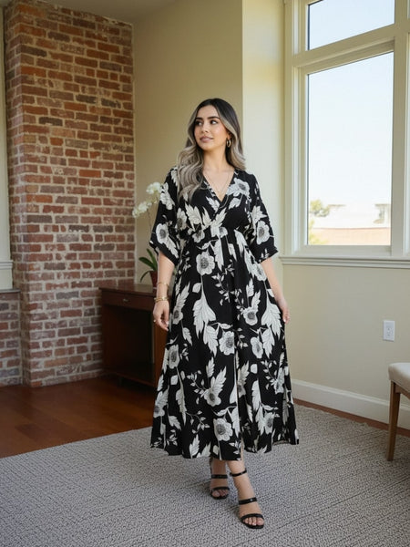 Girl black floral rayon fit and flare dress front view
