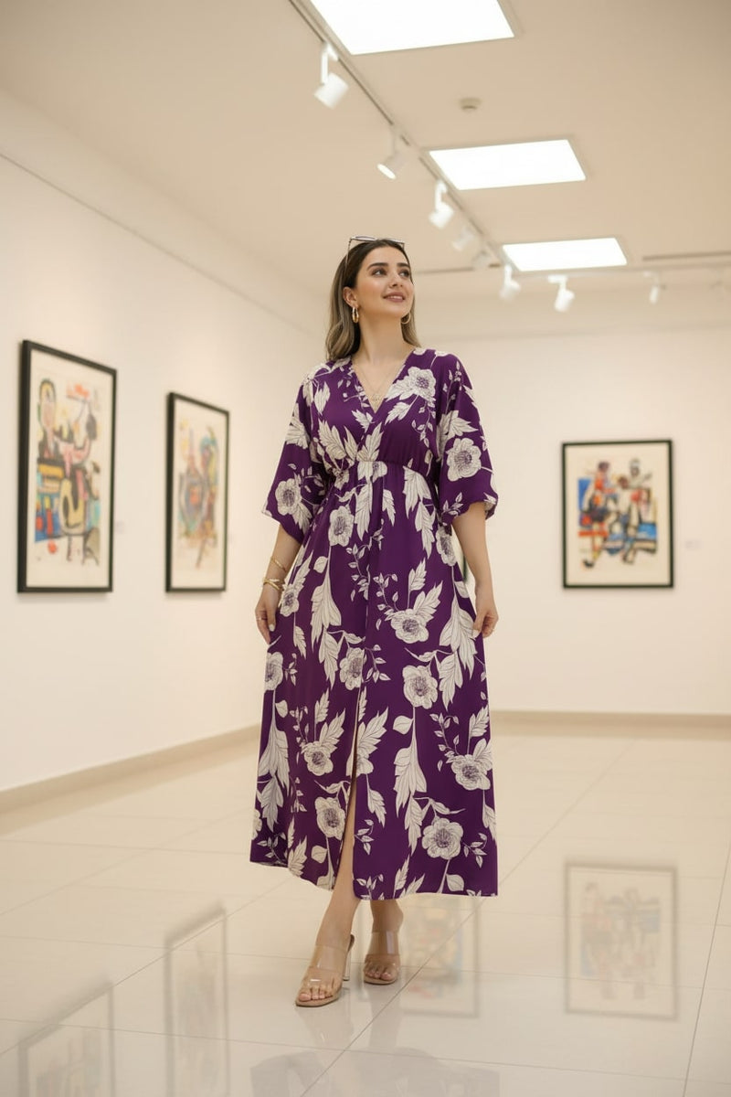 Female wearing purple floral calf length rayon dress
