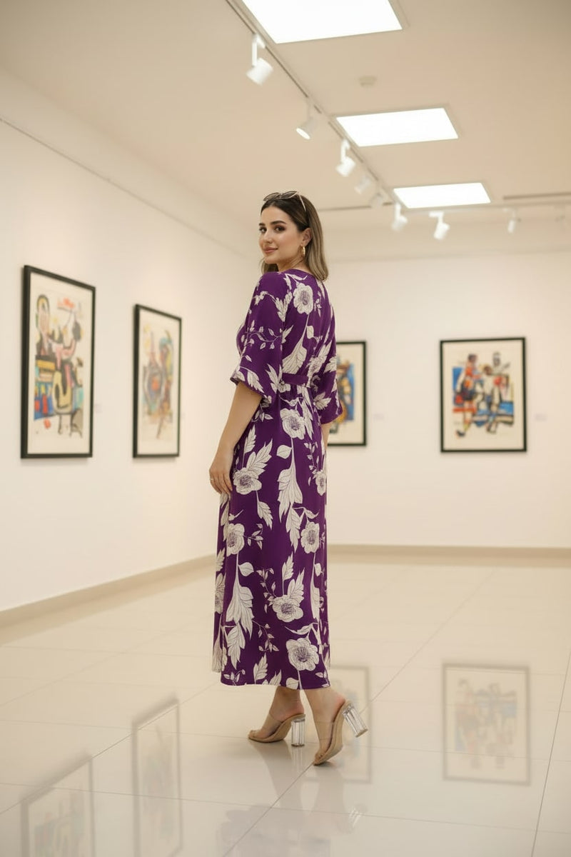 Female purple printed rayon dress gallery pose
