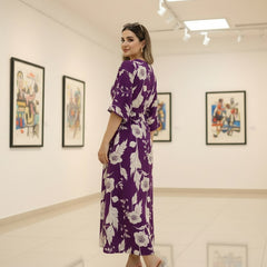 Female purple printed rayon dress gallery pose
