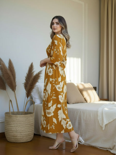 Female wearing yellow floral calf length rayon dress
