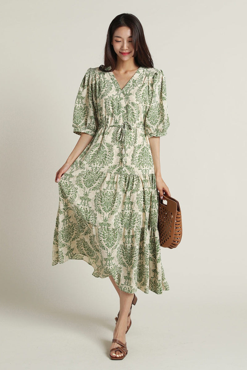 Lady green floral rayon fit and flare dress front view
