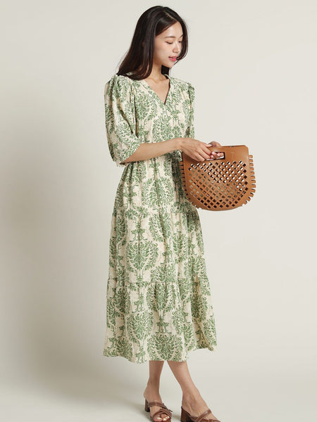 Elegant green floral rayon dress with 3/4 sleeves
