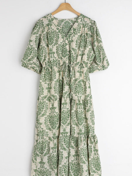 Lady green printed rayon dress side view
