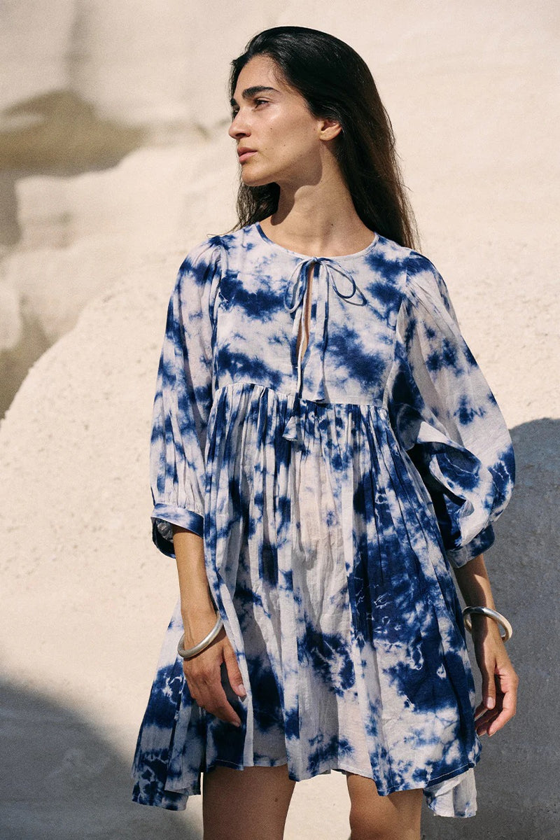 Women wearing white tie dye above knee dress