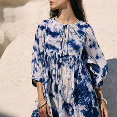 Women wearing white tie dye above knee dress