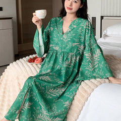 Women Green Printed Midi Dress sitting