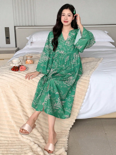 Women Green Printed Midi Dress sitting image