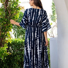 Women wearing blue V neck calf length dress

