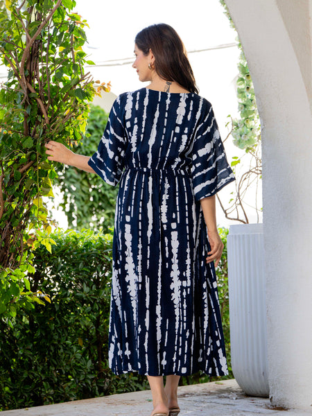 Women wearing blue V neck calf length dress
