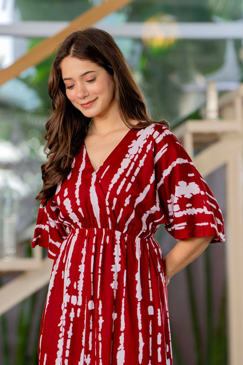 Girl maroon printed rayon dress outdoor look
