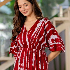 Girl maroon printed rayon dress outdoor look
