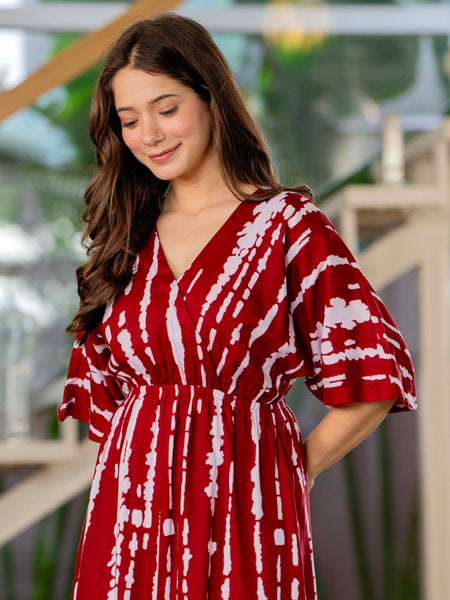 Girl maroon printed rayon dress outdoor look
