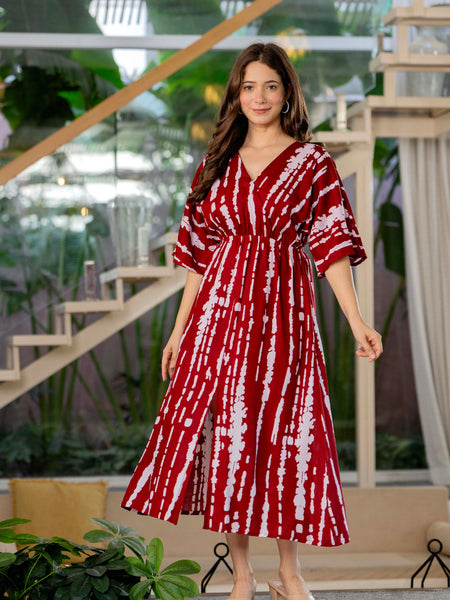 Girl maroon printed rayon dress outdoor look
