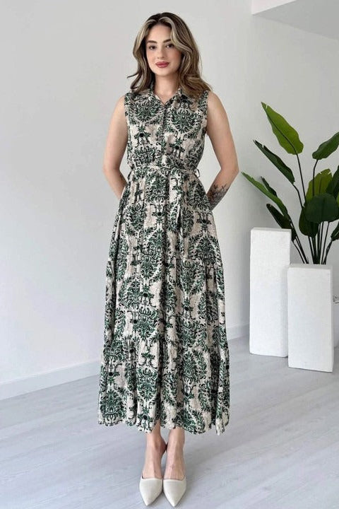 Woman green printed rayon fit and flare dress front view

