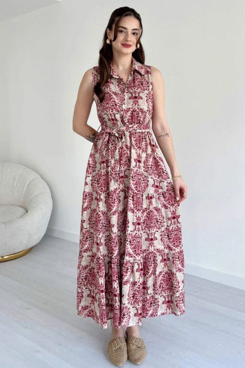 Girl wearing maroon calf length rayon sleeveless dress
