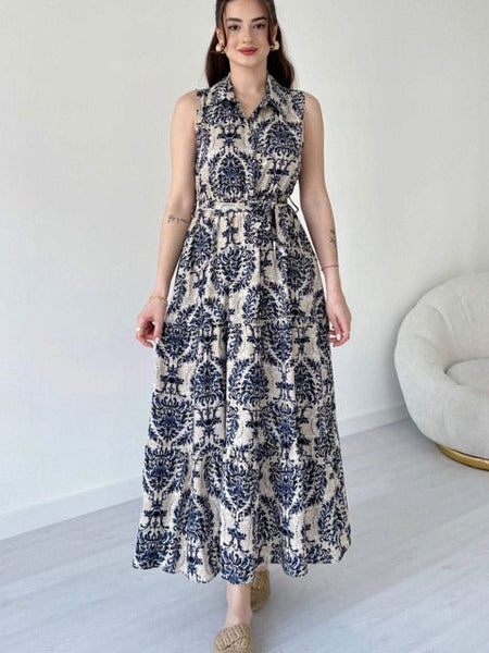 Female black printed rayon fit and flare dress front view
