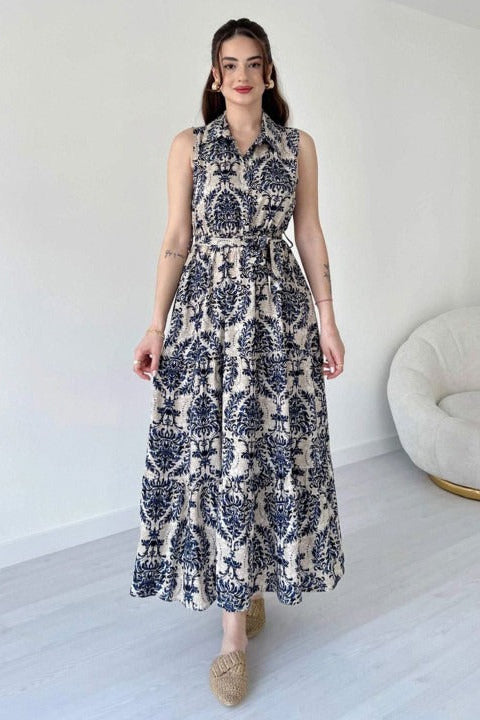 Female black printed rayon fit and flare dress front view
