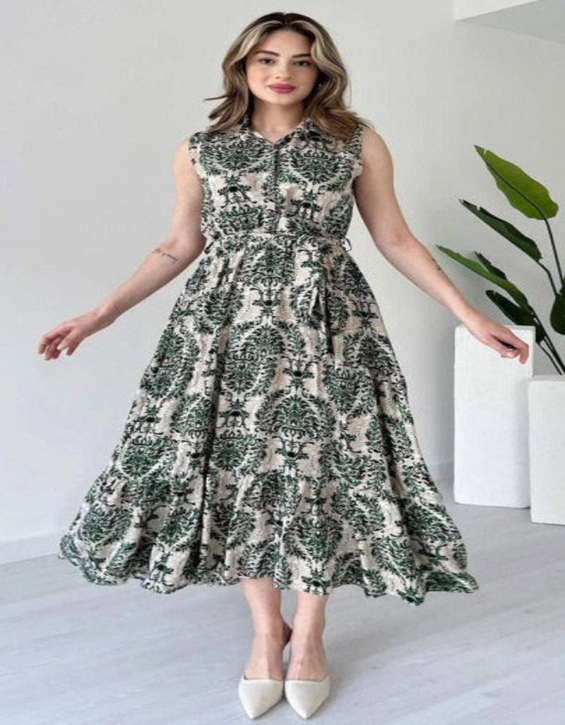 Woman green rayon dress side pose

