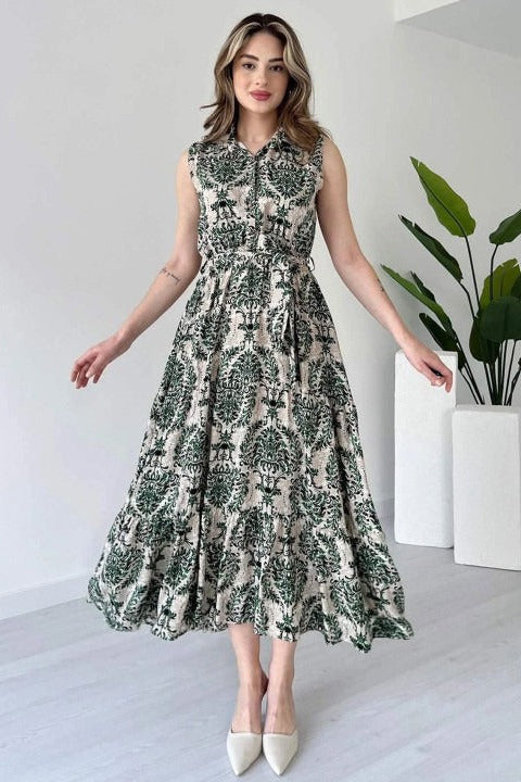 Woman green rayon dress side pose
