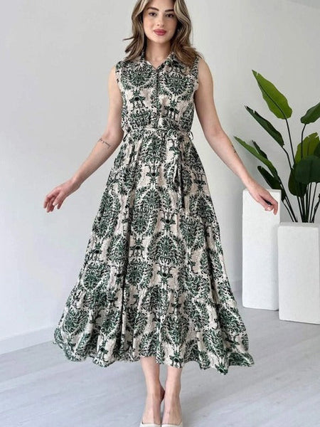 Woman green rayon dress side pose
